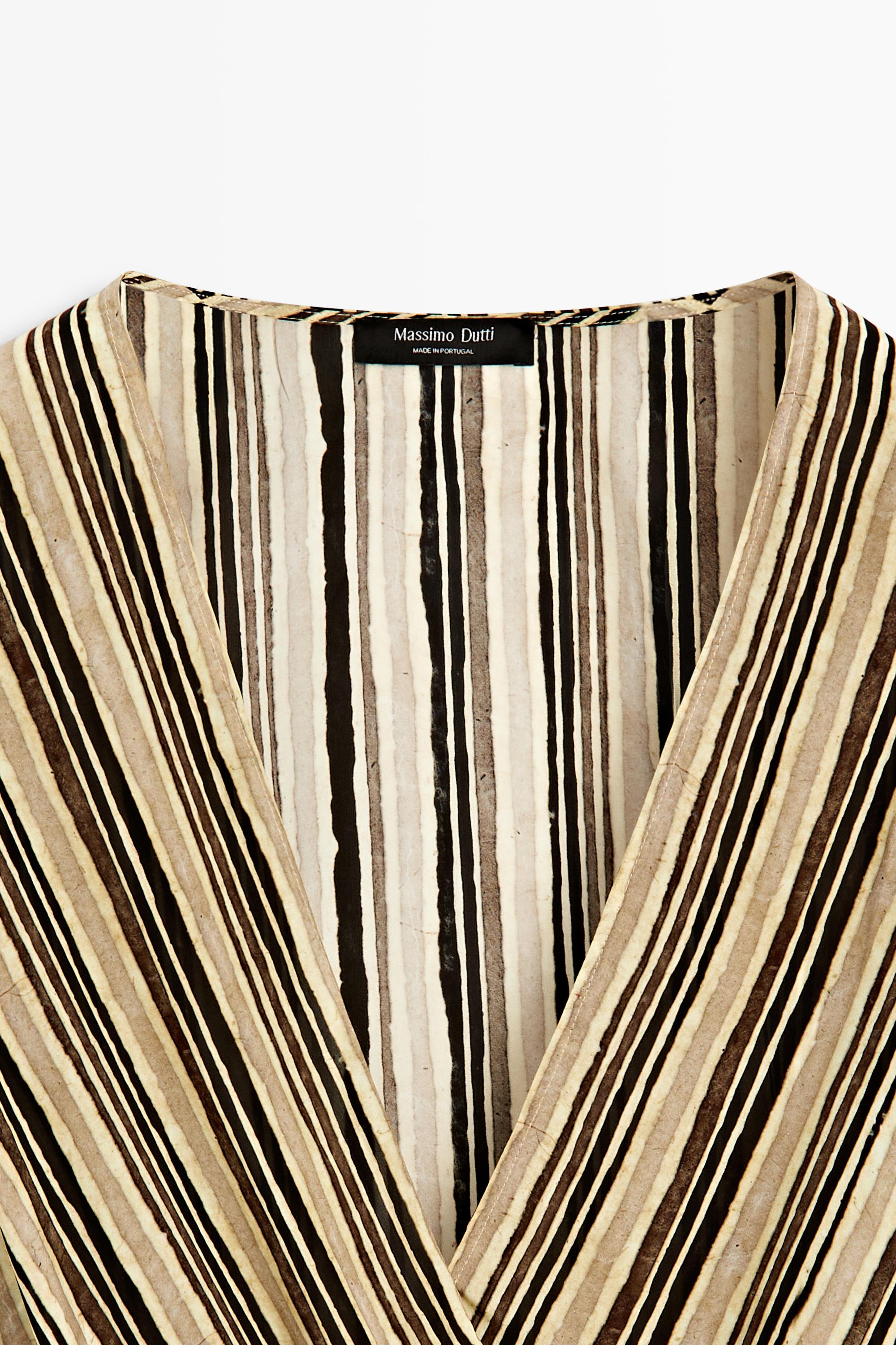 Striped midi dress with corset belt